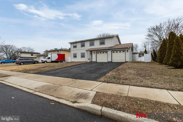 a view of a house with a patio