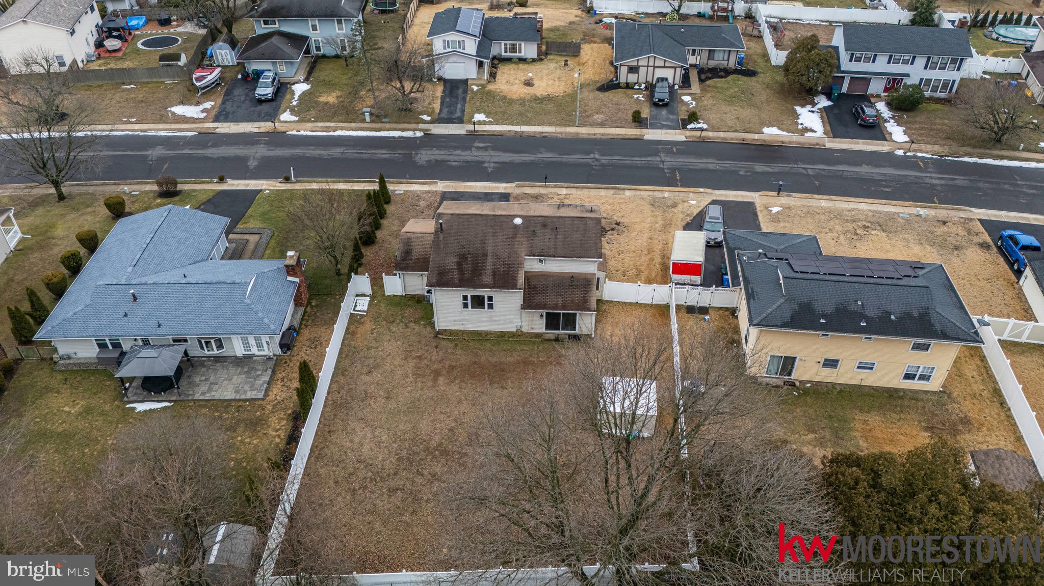 19 Nottingham Way Eastampton, NJ 08060 - Photo 39 of 44 a utility room with lots of different colored cloths