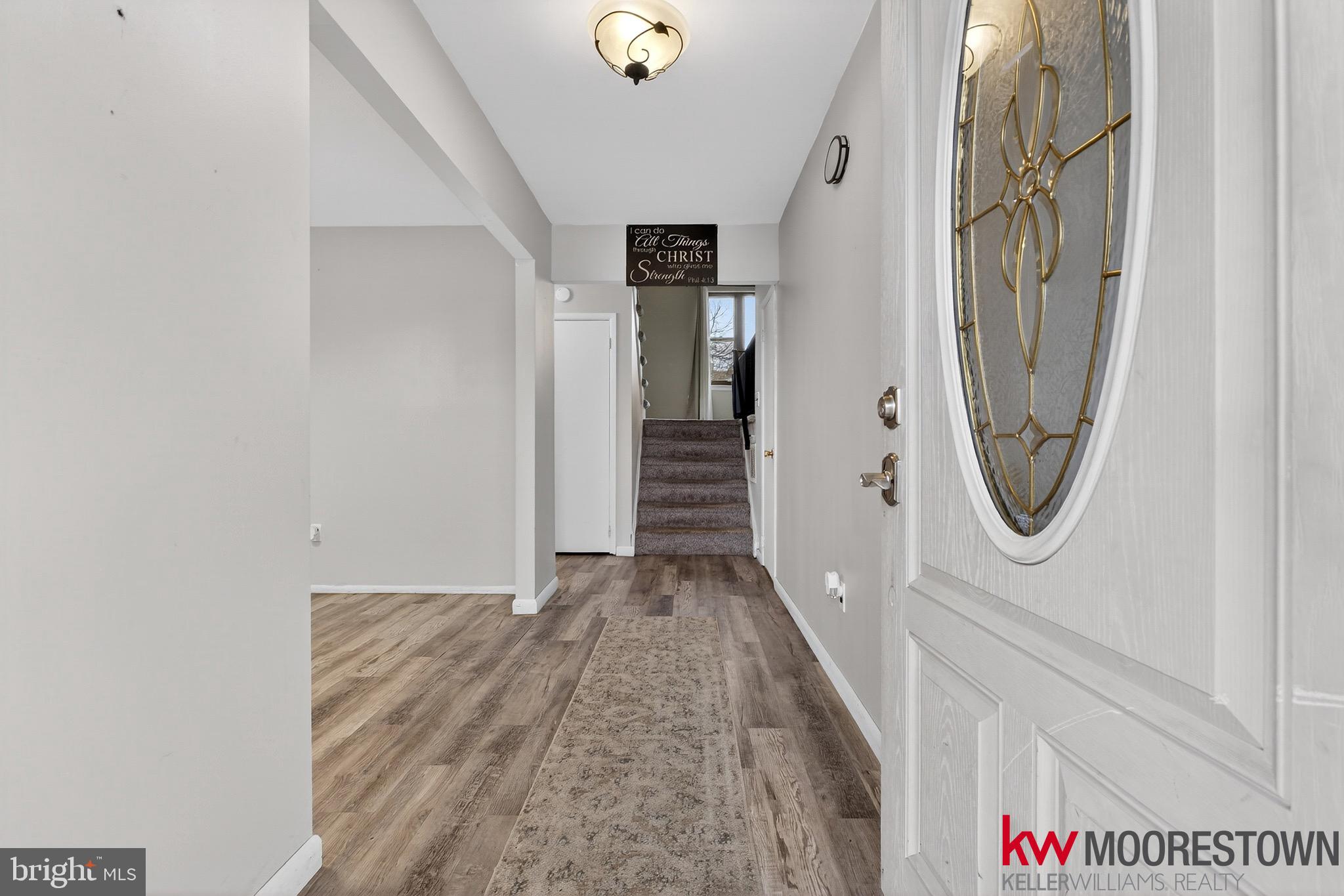 19 Nottingham Way Eastampton, NJ 08060 - Photo 5 of 44 a view of a hallway with wooden floor and entryway