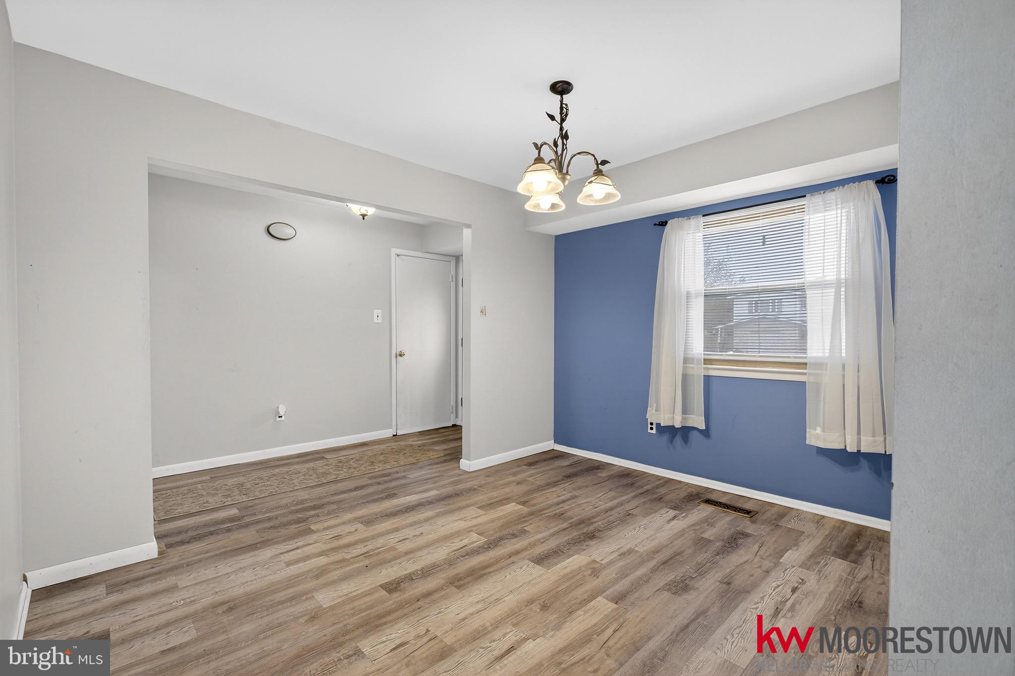 19 Nottingham Way Eastampton, NJ 08060 - Photo 7 of 44 wooden floor in an empty room with a window