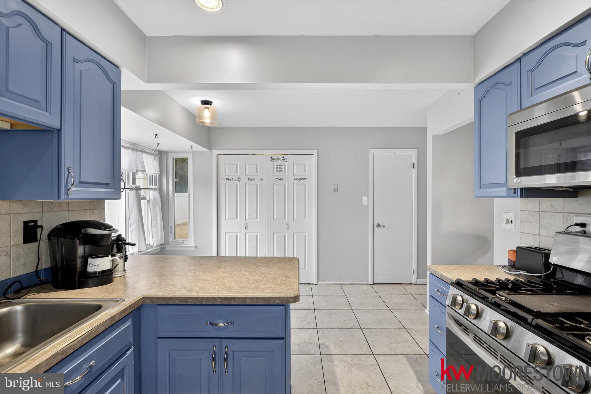 19 Nottingham Way Eastampton, NJ 08060 - Photo 10 of 44 a kitchen with granite countertop a sink a stove and refrigerator