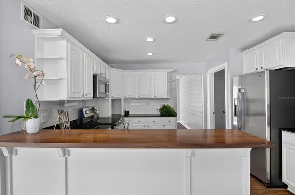 $565,000 | 4472 Winderlakes Drive, Orlando, FL 32835