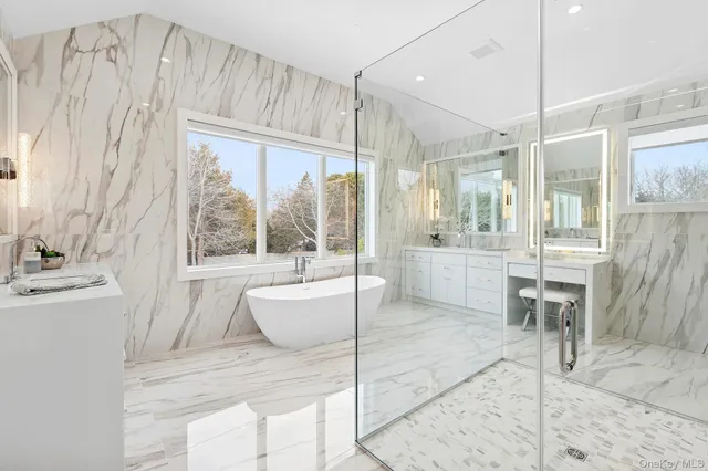 a living room with a large window and table