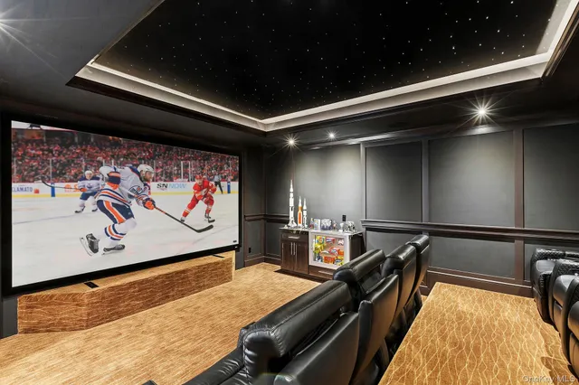 a view of a projector room with furniture