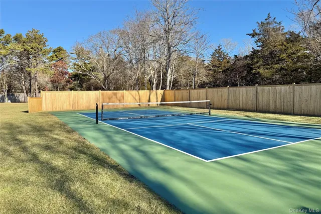 a view of swimming pool with a yard