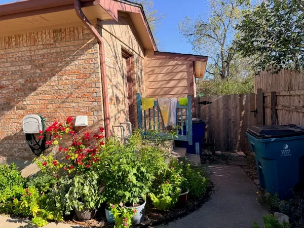 a view of a backyard of the house