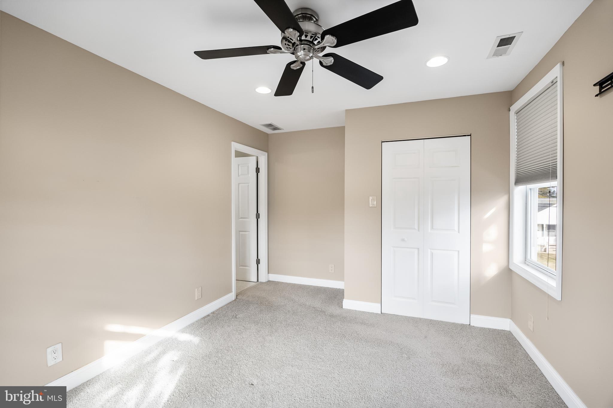 501 West Evesham Road Runnemede, NJ 08078 - Photo 21 of 35 a view of an empty room and a ceiling fan