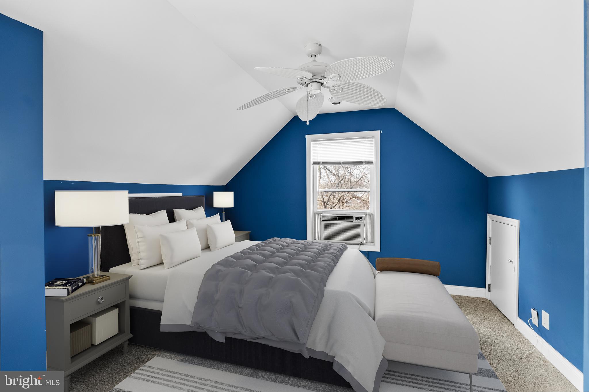 501 West Evesham Road Runnemede, NJ 08078 - Photo 29 of 35 a bedroom with a bed and a chandelier