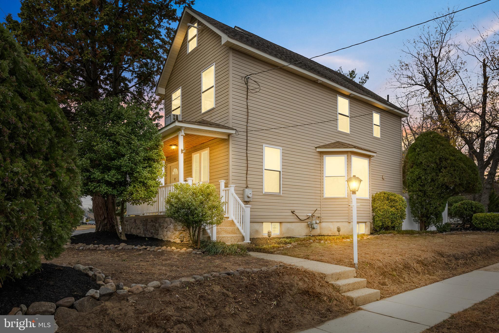 501 West Evesham Road Runnemede, NJ 08078 - Photo 6 of 35 a front view of a house with garden