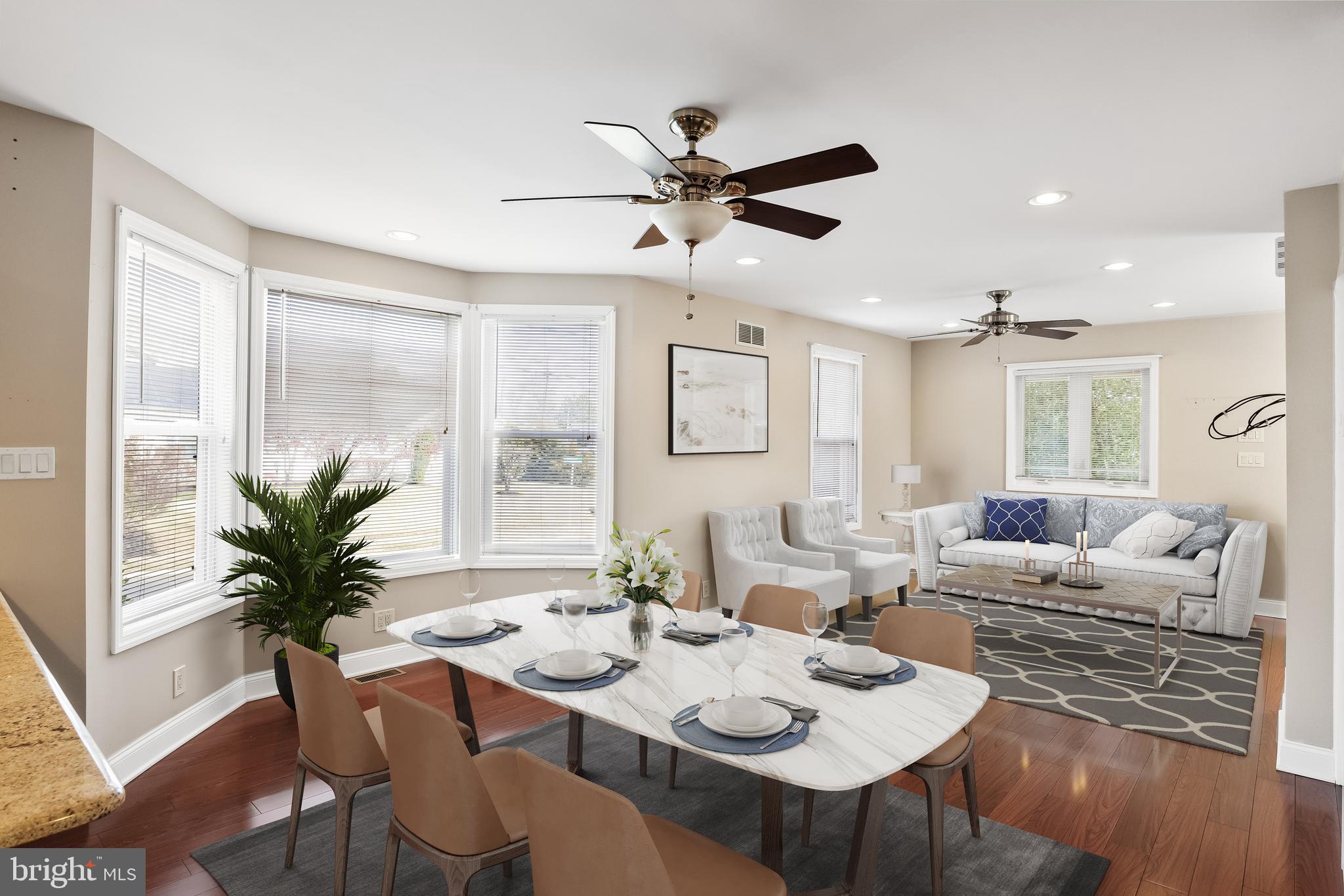 501 West Evesham Road Runnemede, NJ 08078 - Photo 7 of 35 a view of a dining room with furniture window and wooden floor