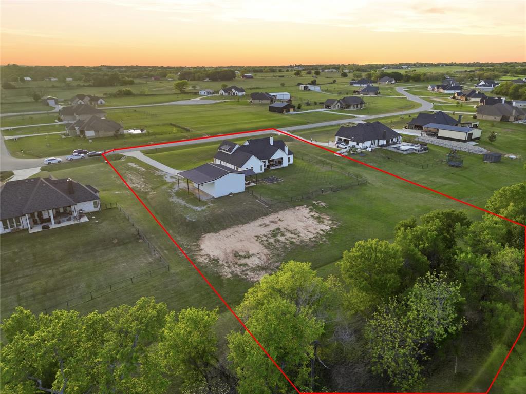 221 Proctor Lane Decatur, TX 76234 - Photo 30 of 30 an aerial view of a house with a yard