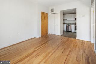 724 South Wolfe Street, Unit 4B Baltimore, MD 21231 - Photo 4 of 9 Bright, open space with hardwood floors.