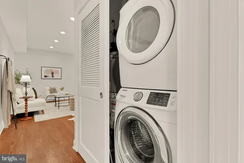 a view of a storage & utility room with a sink