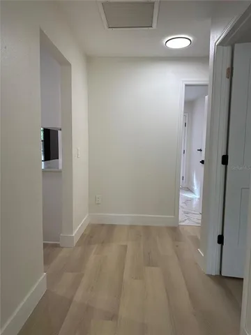 a bathroom with a toilet and a bathtub