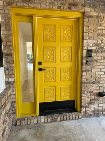 a view of livingroom with wooden floor and a window