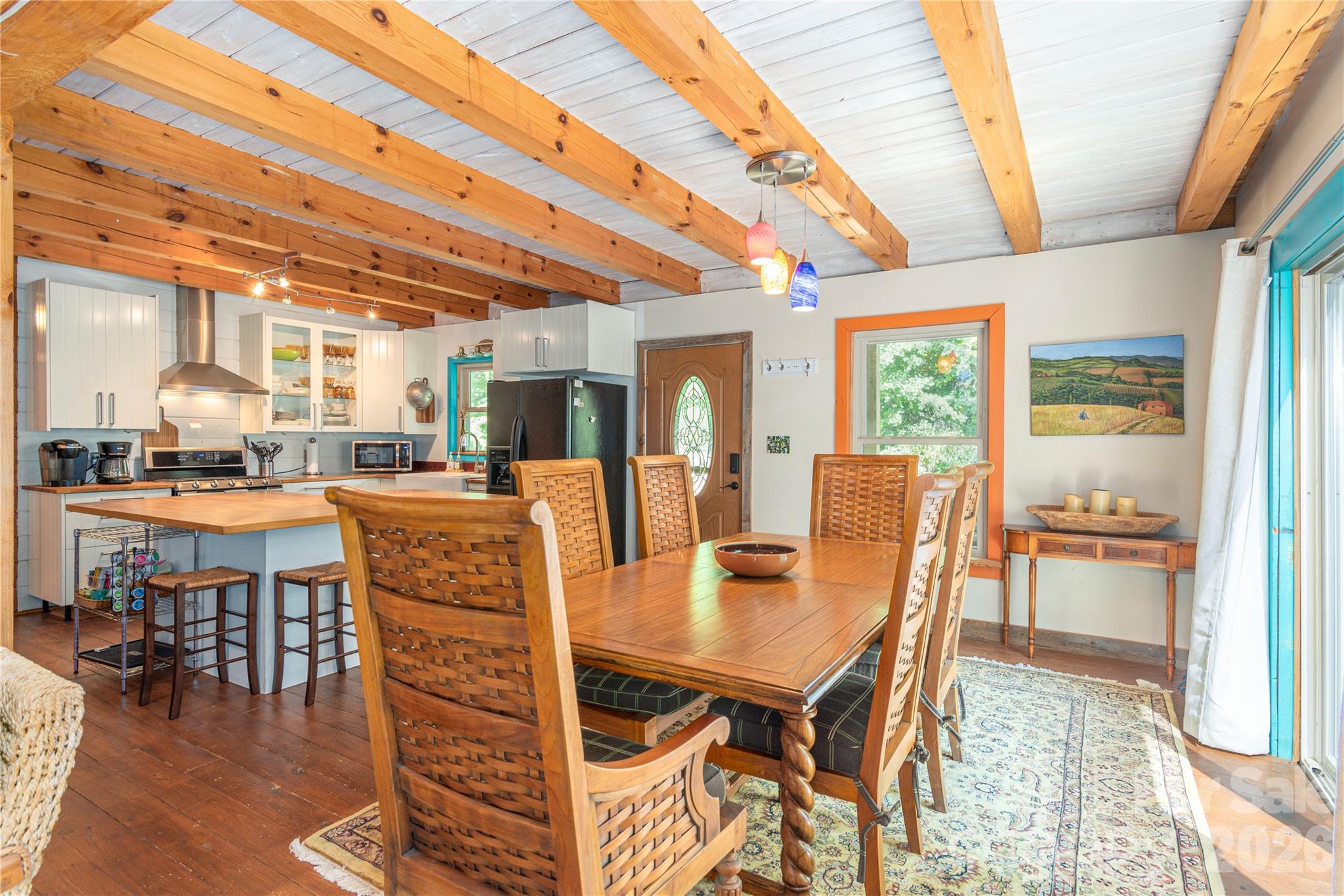 40 Shook Cove Road Leicester, NC 28748 - Photo 12 of 48 a dining room with furniture window and wooden floor