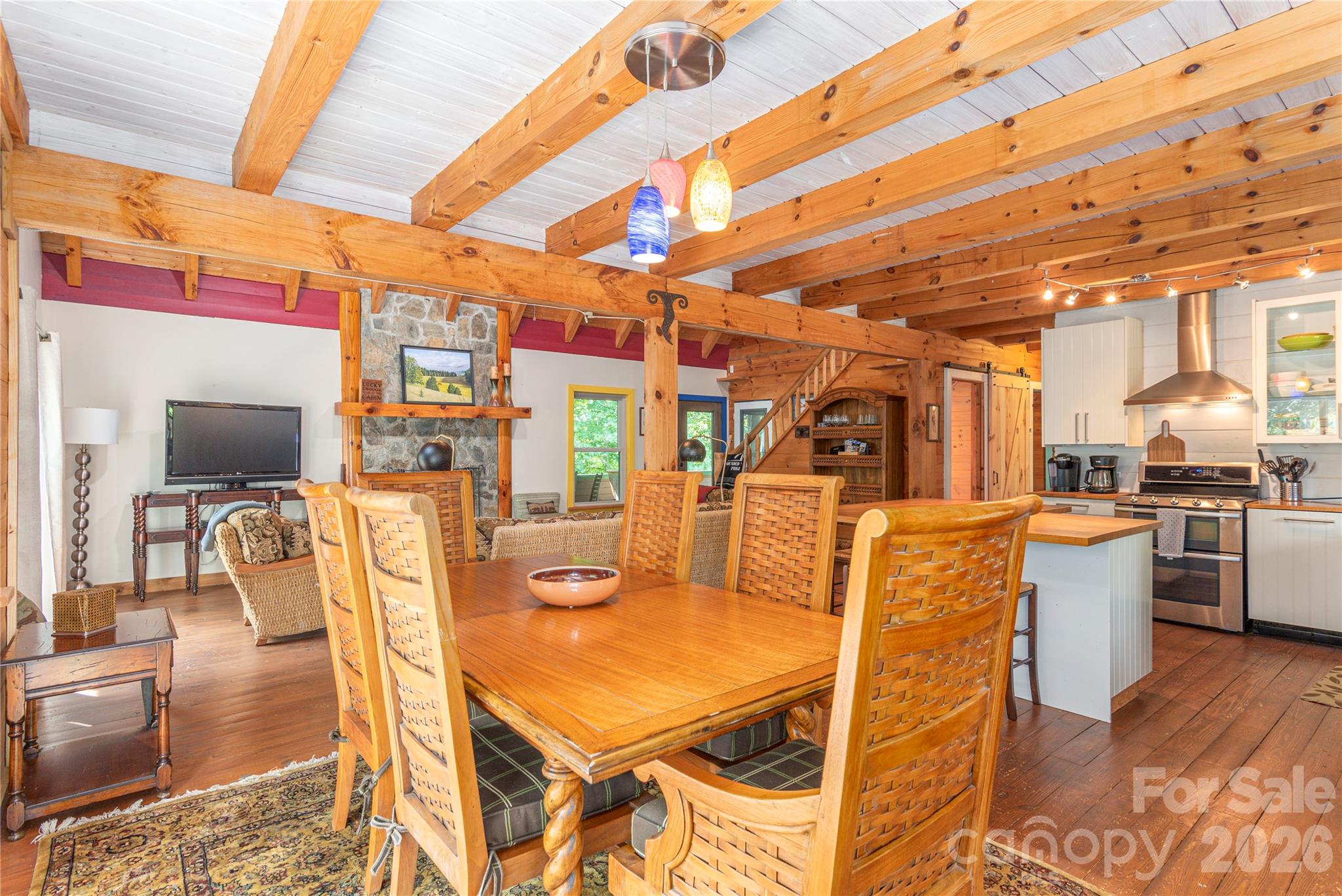 40 Shook Cove Road Leicester, NC 28748 - Photo 14 of 48 a view of a dining room with furniture