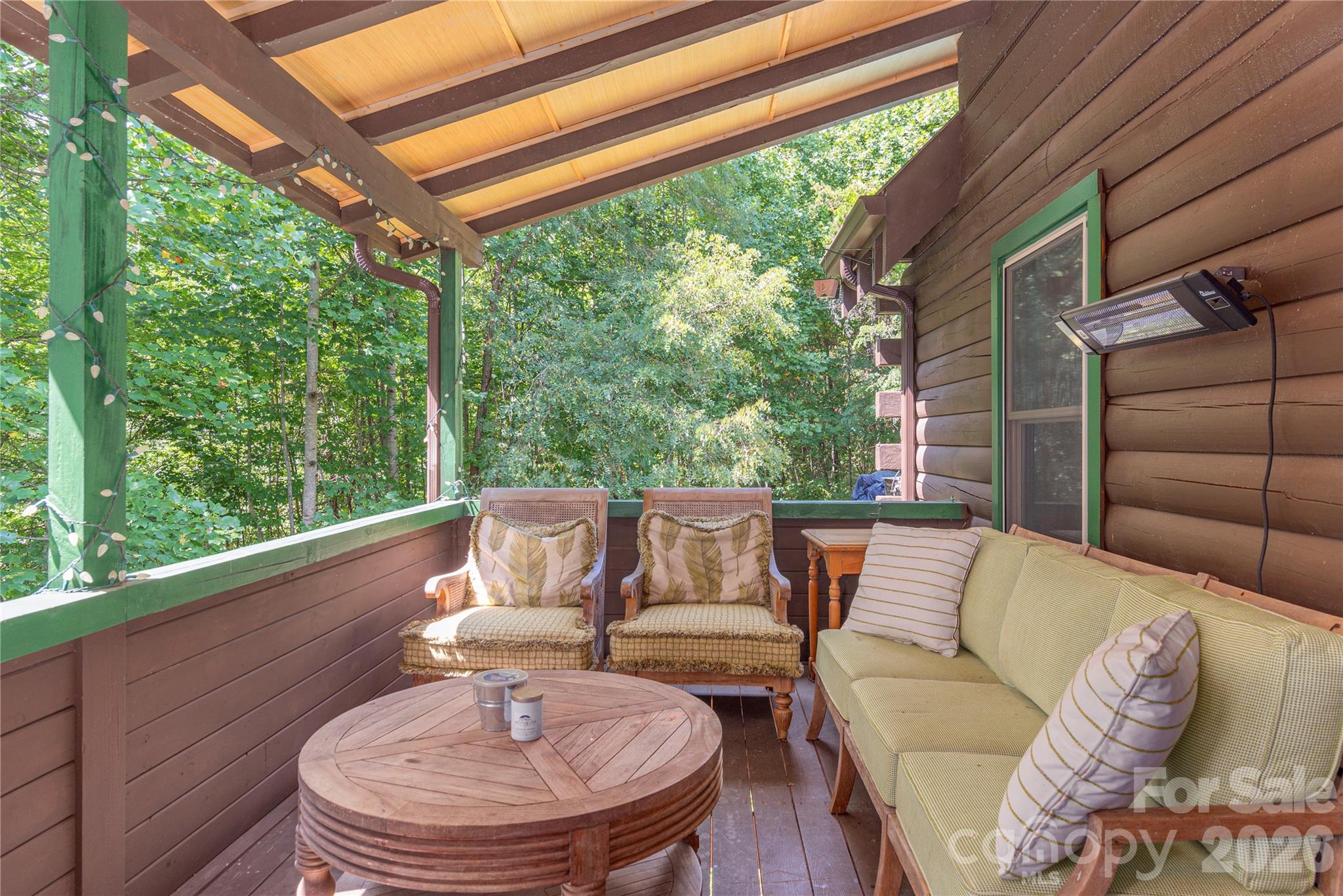 40 Shook Cove Road Leicester, NC 28748 - Photo 27 of 48 a balcony with furniture and wooden floor