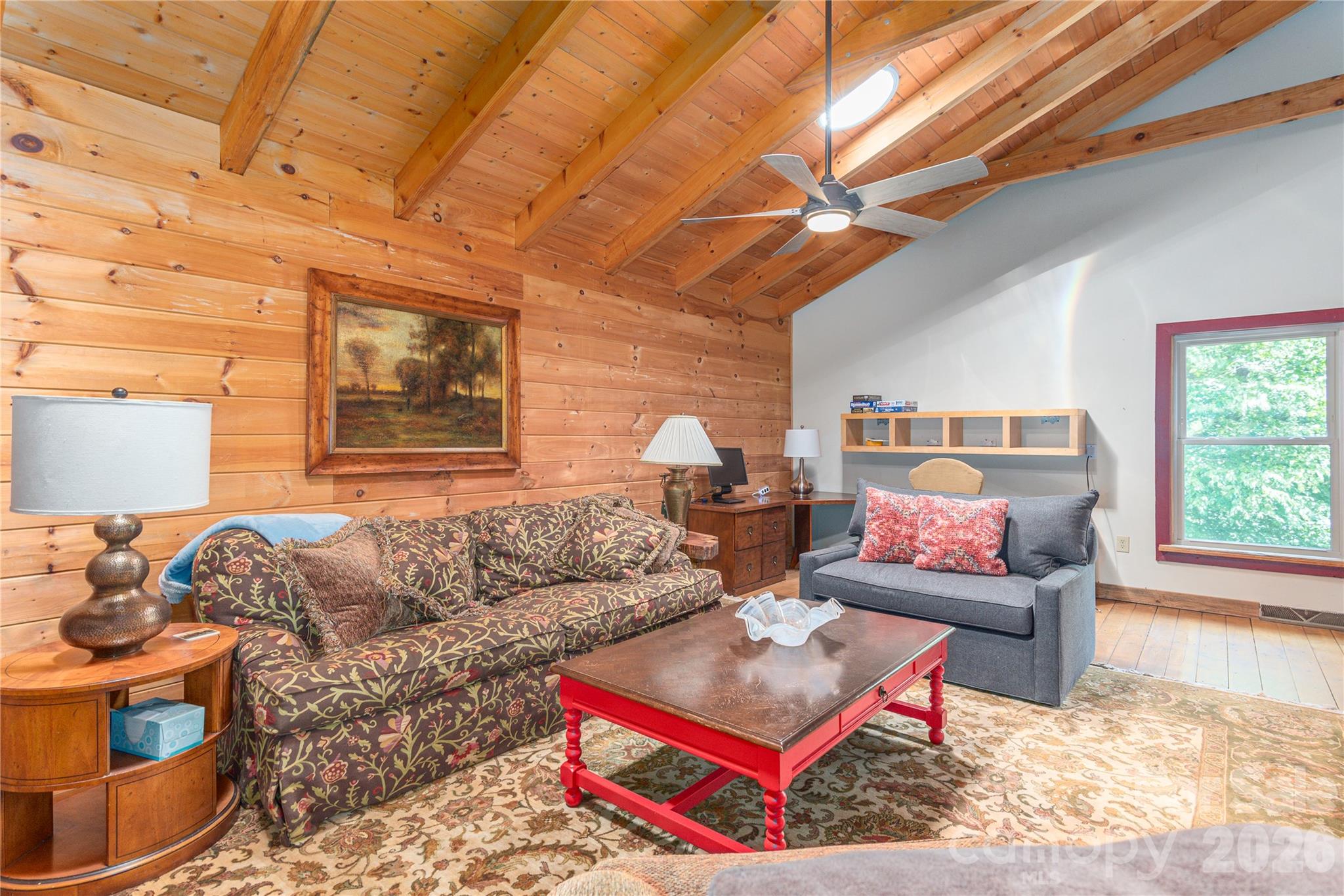 40 Shook Cove Road Leicester, NC 28748 - Photo 29 of 48 a living room with furniture a rug and a window