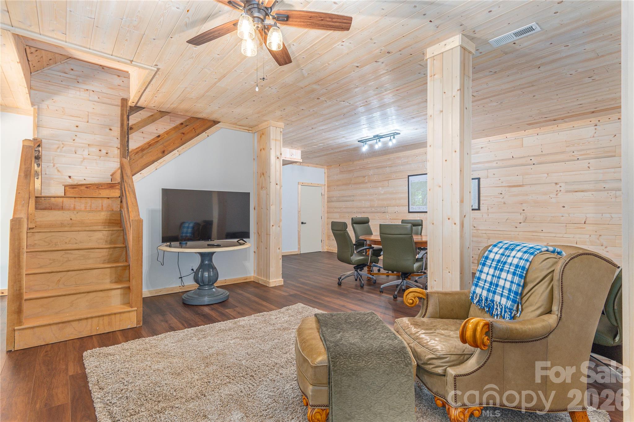 40 Shook Cove Road Leicester, NC 28748 - Photo 39 of 48 a living room with furniture and a flat screen tv