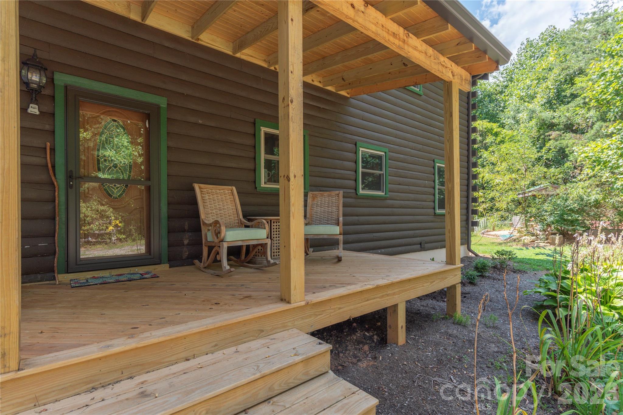 40 Shook Cove Road Leicester, NC 28748 - Photo 4 of 48 a view of two chairs in the balcony