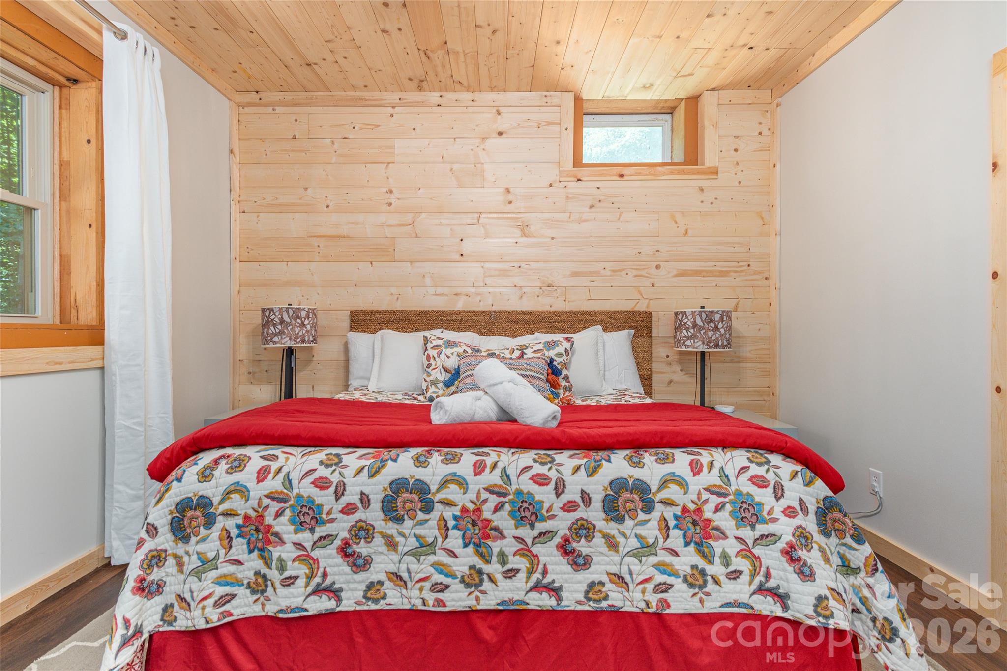 40 Shook Cove Road Leicester, NC 28748 - Photo 42 of 48 a bedroom with a bed and a night stand