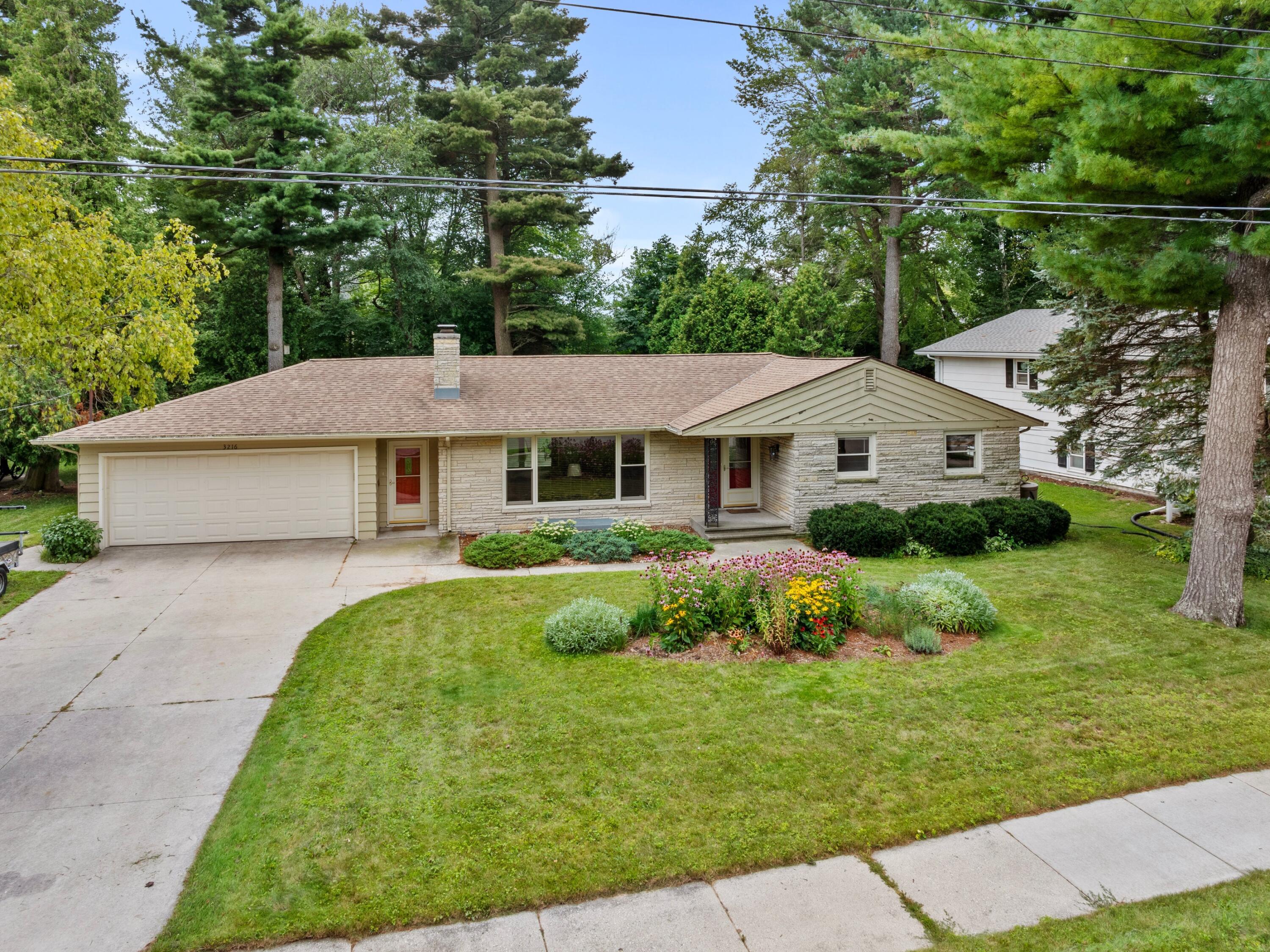 3216 Adams Street Two Rivers, WI 54241 - Photo 1 of 1 Wooded backdrop