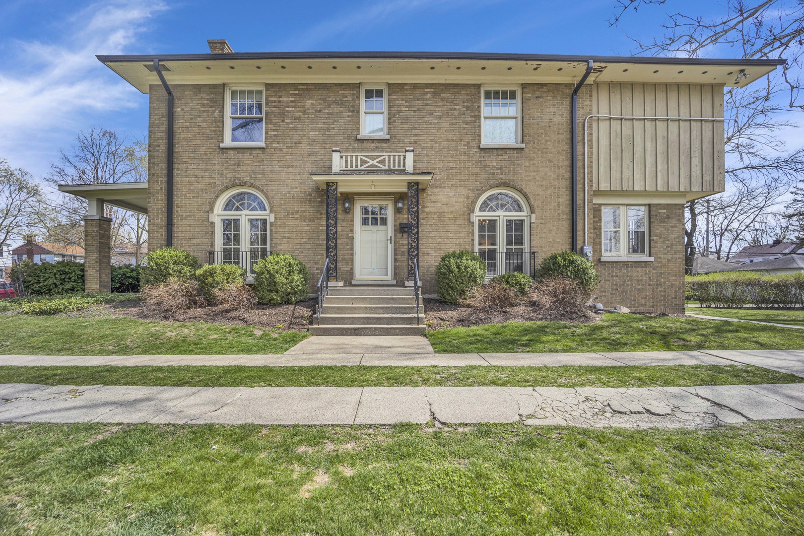 247 Lawton Road Riverside, IL 60546 - Photo 1 of 1 a front view of a house with a garden