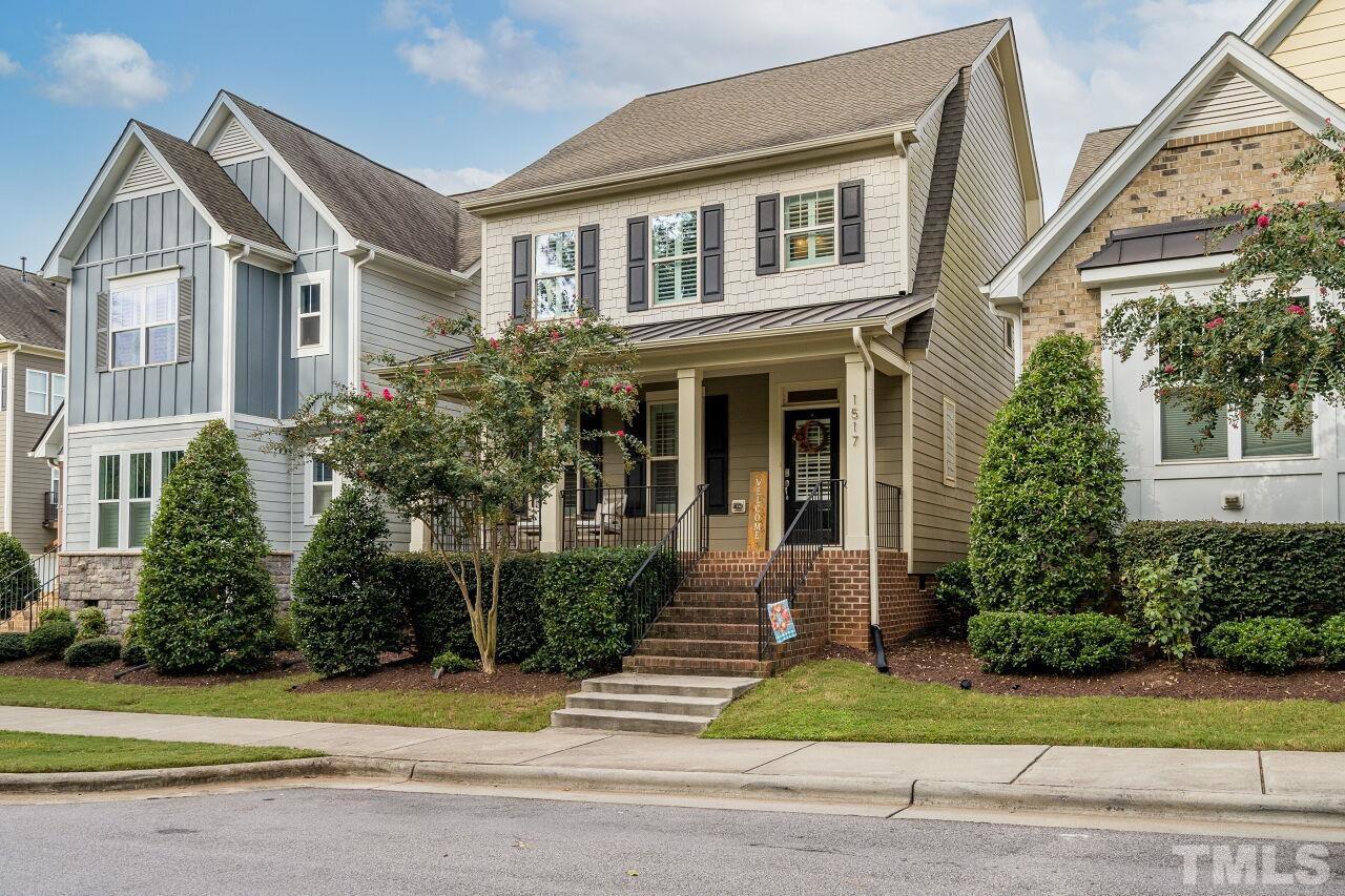 1517 Fullerton Place Raleigh, NC 27607 - Photo 2 of 30 Relax on the front porch w/ elevated view of the woods or walk on the tree lined streets with extra wide sidewalks!