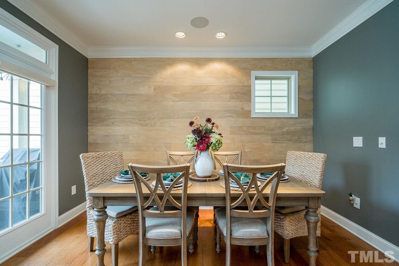 1517 Fullerton Place Raleigh, NC 27607 - Photo 11 of 30 Surround sound and view of the private backyard all in this open dining area!