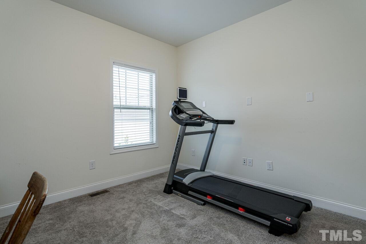 1517 Fullerton Place Raleigh, NC 27607 - Photo 25 of 30 Secondary bedroom upstairs---perfect for bedroom, home gym or home office.