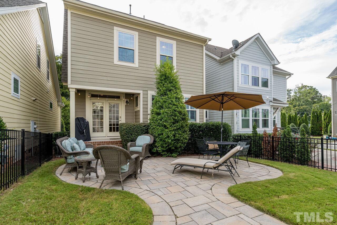 1517 Fullerton Place Raleigh, NC 27607 - Photo 28 of 30 Private backyard w/ custom paver patio added and additional room to play! Fully fenced yard with easy access to two car garage and parking pad. Best of all, the HOA maintains your yard and landscaping!