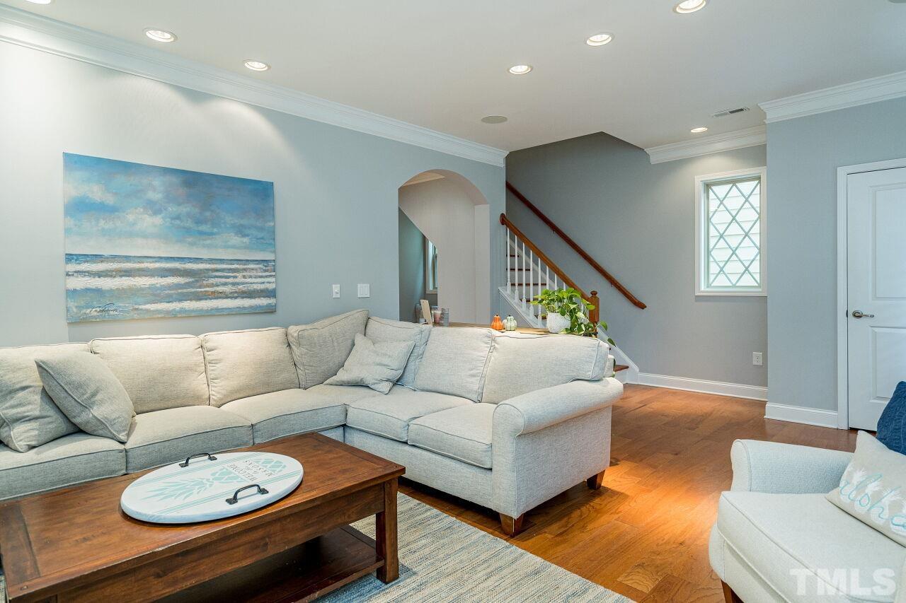 1517 Fullerton Place Raleigh, NC 27607 - Photo 5 of 30 Shutters, hardwoods, recessed lighting, surround sound speakers & fireplace make this living room easy to entertain!