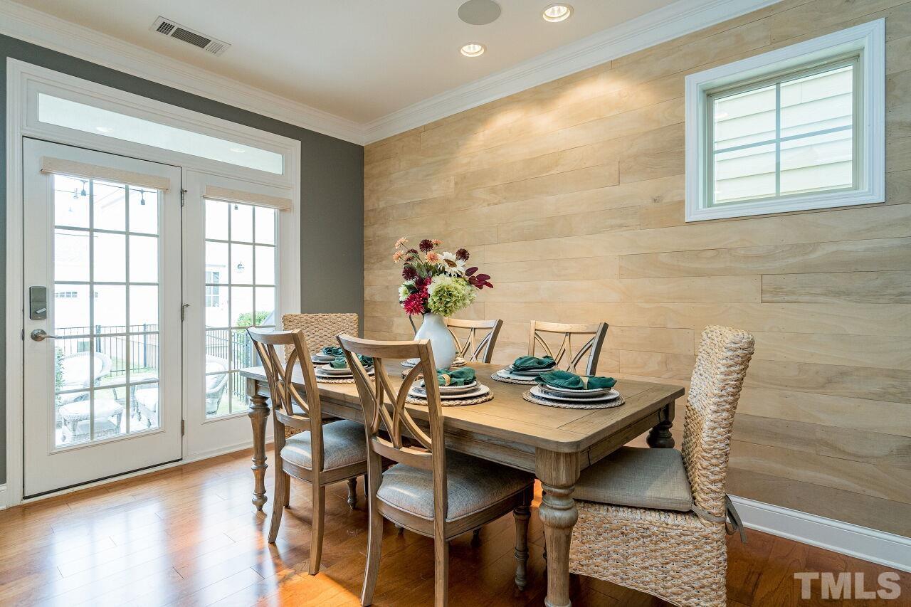 1517 Fullerton Place Raleigh, NC 27607 - Photo 10 of 30 Hardwoods, shiplap and open concept area make gathering together great.