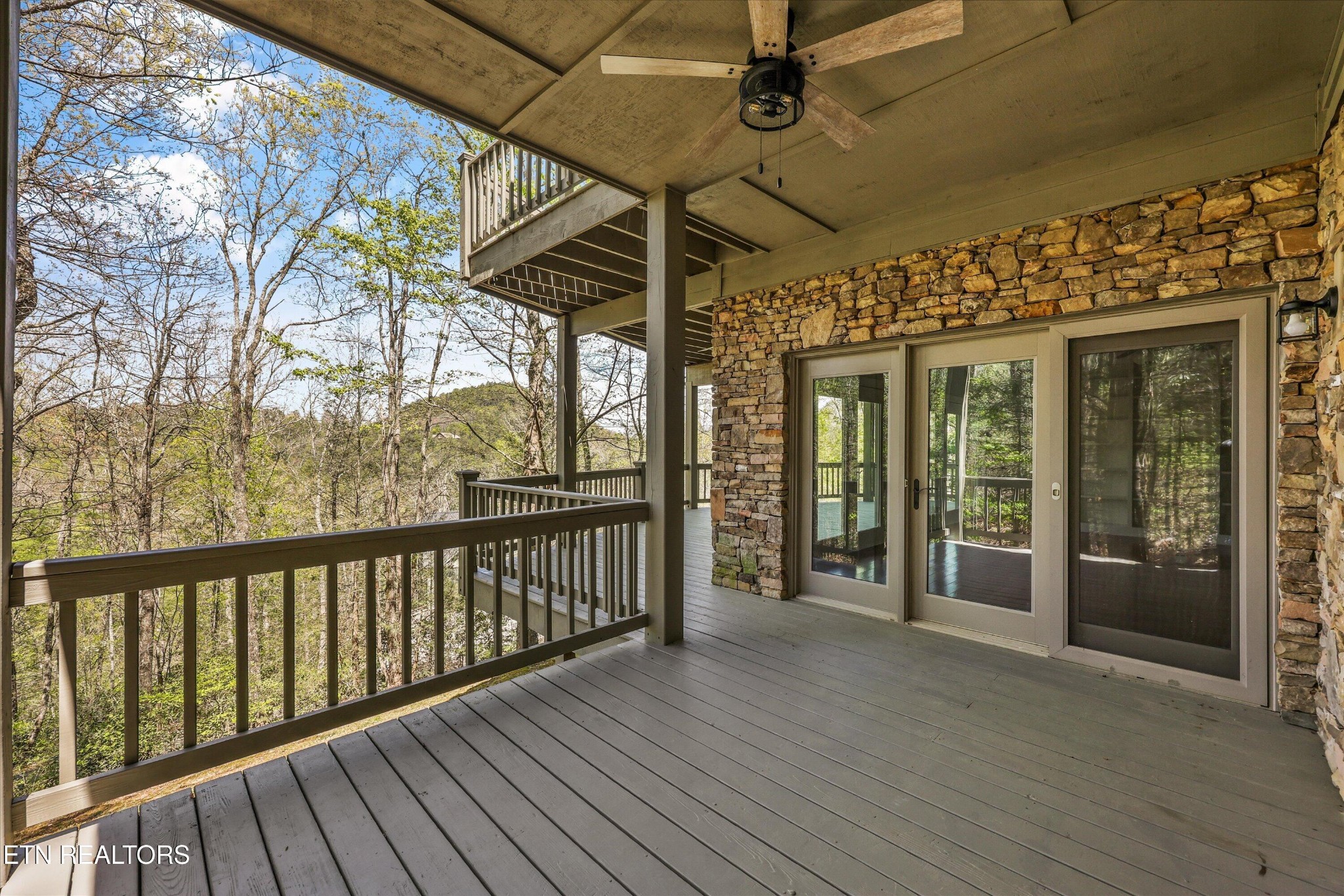 865 Stonegate Way Townsend, TN 37882 - Photo 47 of 60 a view of a porch with wooden floor