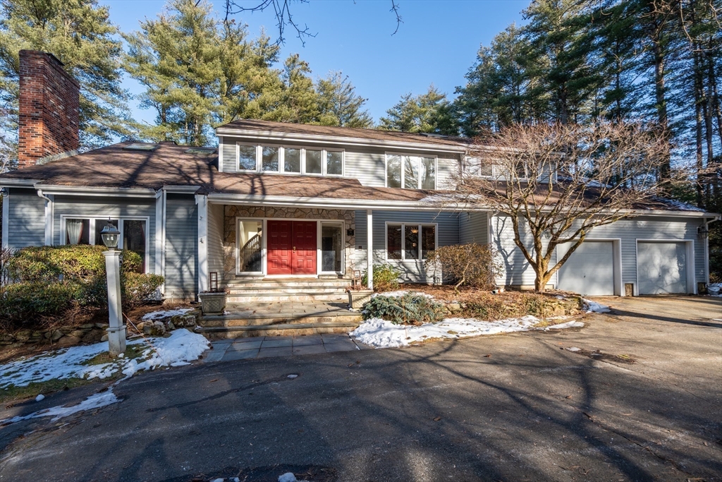 18 Fox Run Road Sudbury, MA 01776 - Photo 1 of 41 a front view of house with yard outdoor seating and barbeque oven