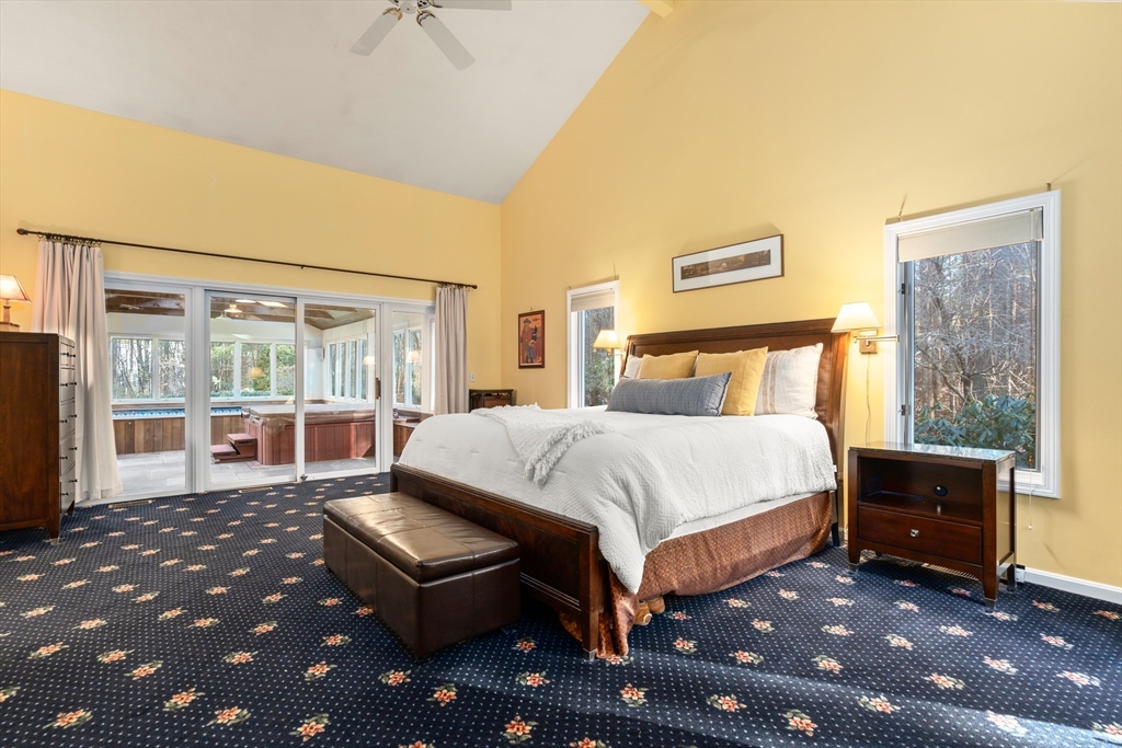 18 Fox Run Road Sudbury, MA 01776 - Photo 16 of 41 a bedroom with a large bed and a night stand