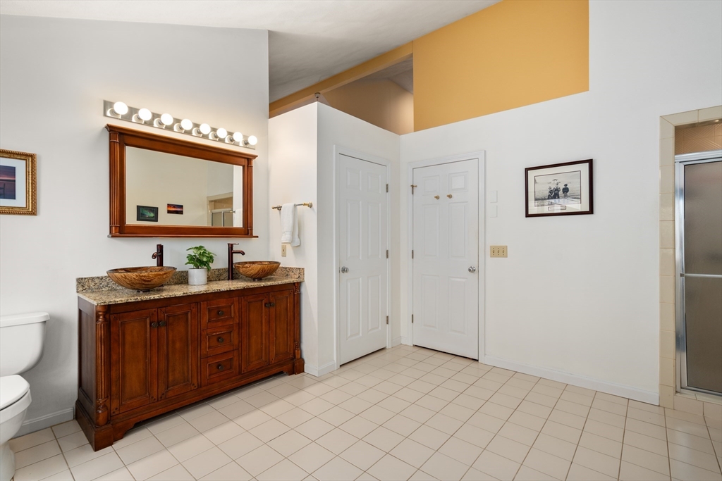 18 Fox Run Road Sudbury, MA 01776 - Photo 18 of 41 a view of a bathroom with sink mirror and toilet