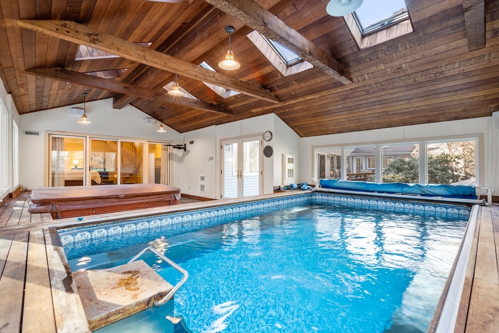 18 Fox Run Road Sudbury, MA 01776 - Photo 20 of 41 a view of a swimming pool with a outdoor seating