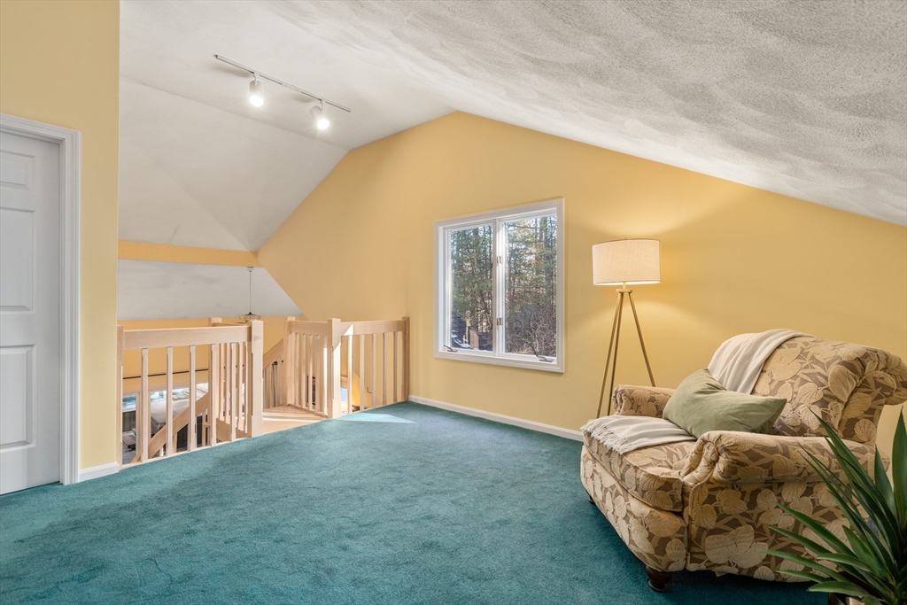 18 Fox Run Road Sudbury, MA 01776 - Photo 21 of 41 a living room with furniture and a table