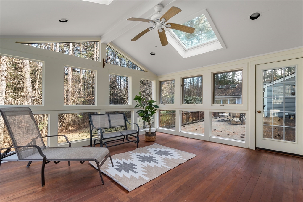 18 Fox Run Road Sudbury, MA 01776 - Photo 22 of 41 a living room with furniture a window and wooden floor