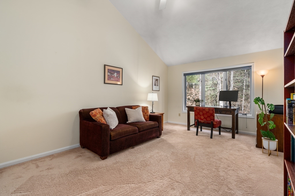 18 Fox Run Road Sudbury, MA 01776 - Photo 25 of 41 a living room with furniture a dining table and a piano table