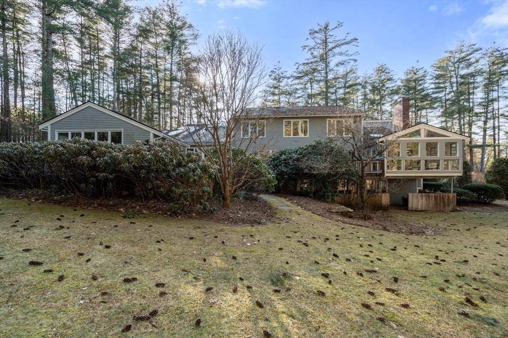 18 Fox Run Road Sudbury, MA 01776 - Photo 30 of 41 a front view of a house with a yard