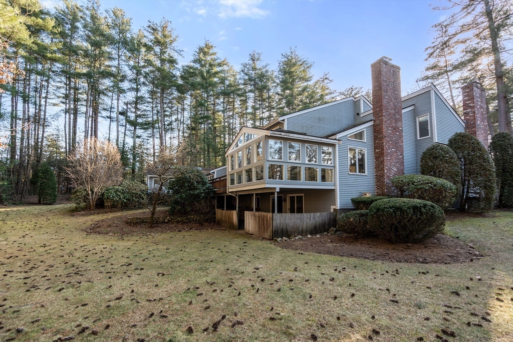 18 Fox Run Road Sudbury, MA 01776 - Photo 31 of 41 a front view of a house with a garden