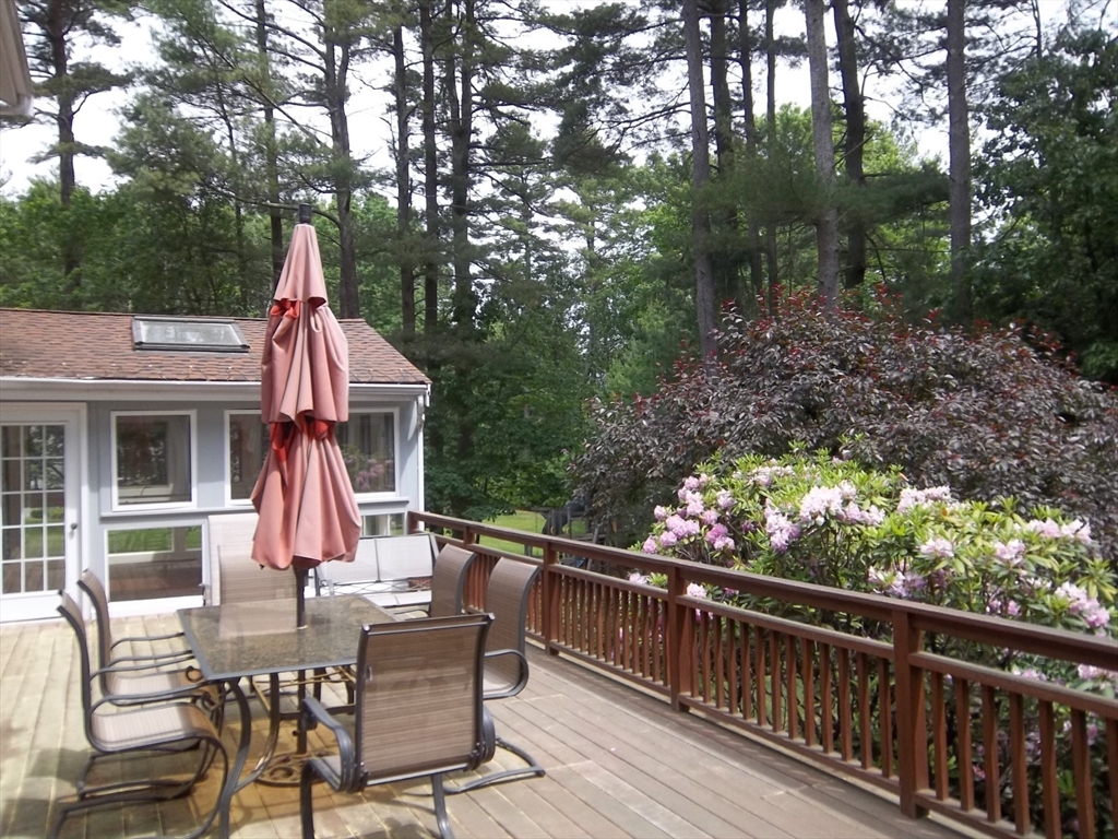 18 Fox Run Road Sudbury, MA 01776 - Photo 33 of 41 a view of a chair and tables in the balcony
