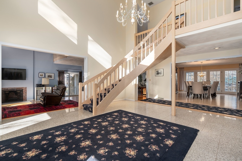 18 Fox Run Road Sudbury, MA 01776 - Photo 5 of 41 a view of entryway and hall with wooden floor
