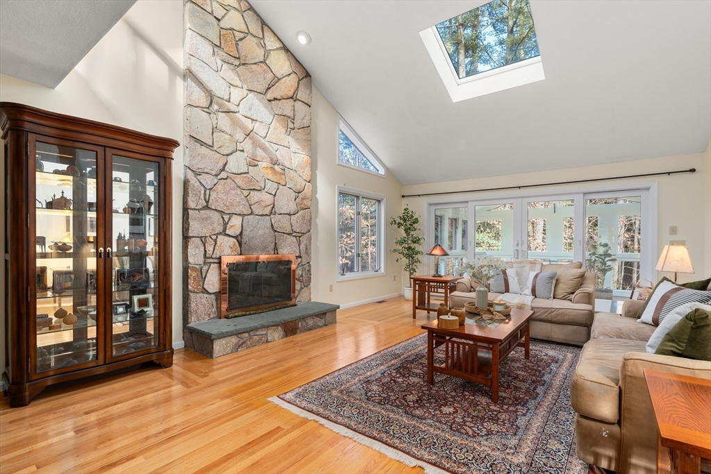 18 Fox Run Road Sudbury, MA 01776 - Photo 6 of 41 a living room with furniture and a flat screen tv