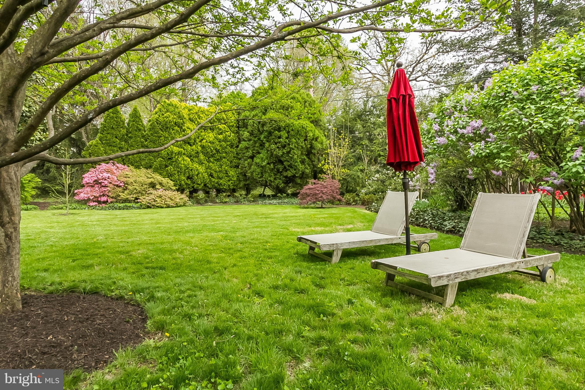 302 Club Road Baltimore, MD 21210 - Photo 25 of 28 a view of a chair and table in backyard of the house
