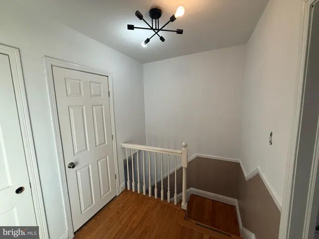 a view of a hallway with workspace