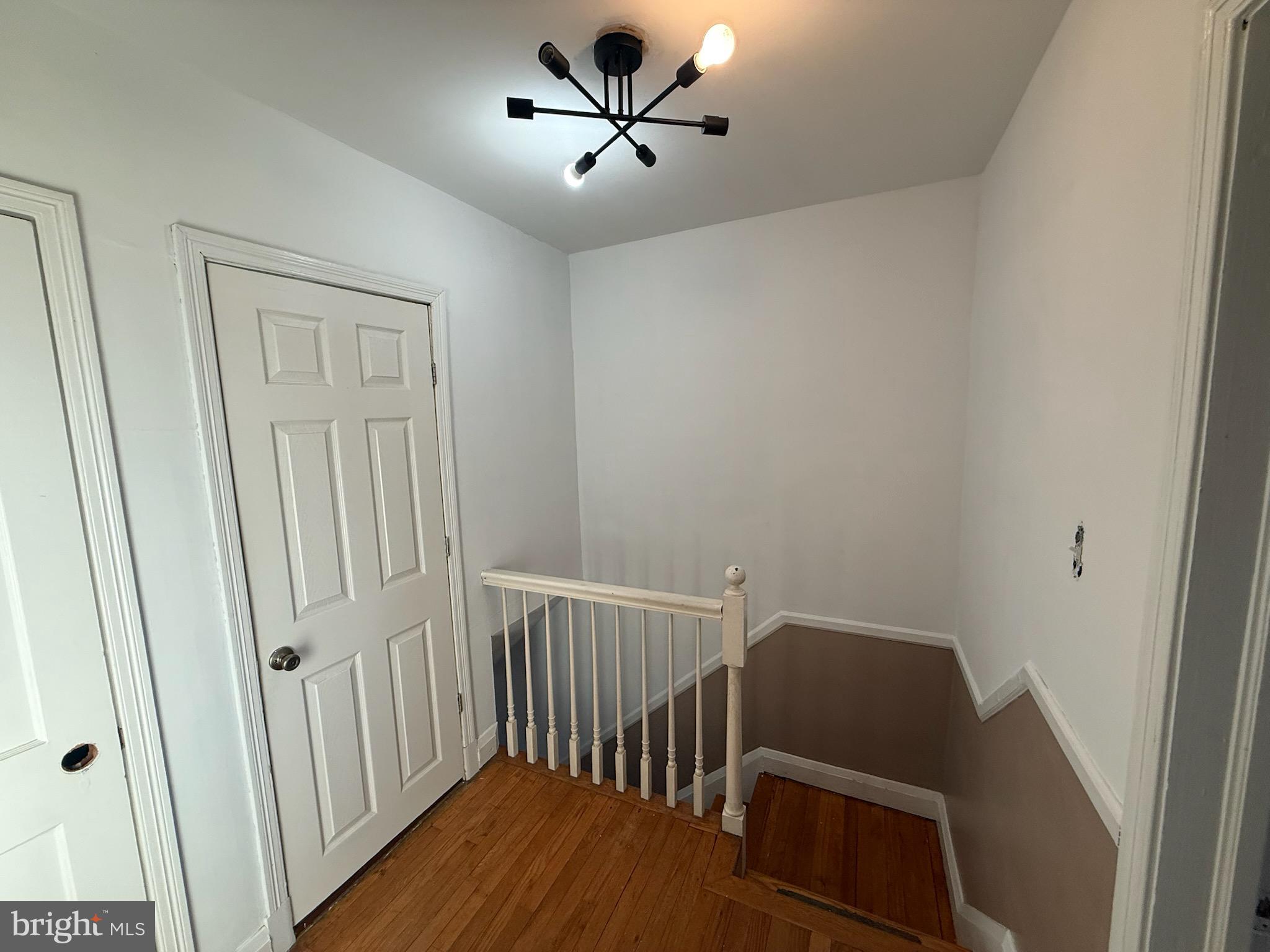 49 Briarwood Road Baltimore, MD 21228 - Photo 3 of 9 a view of a hallway with workspace